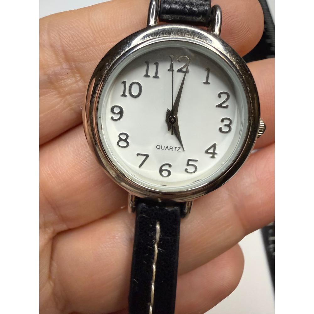 Quartz Women Watch Silver Tone White Dial Black Strap 28369KMT A126-10